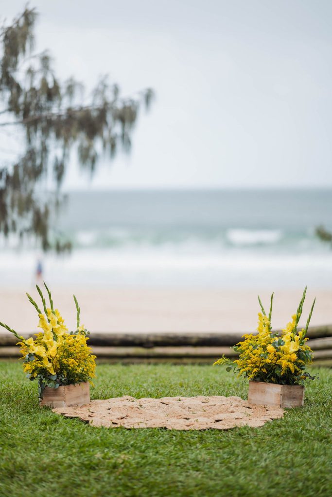 simple elopement ceremony decor with yellow flowers