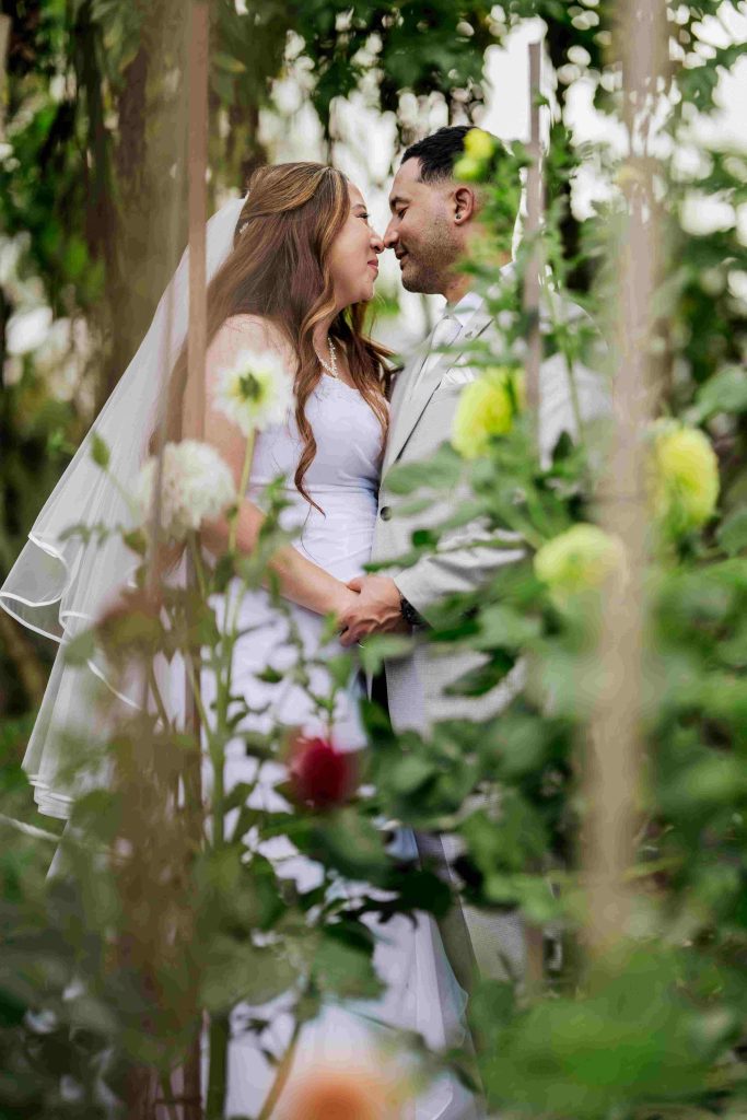 Photography ideas elopement wedding in Brisbane newlyweds among natures flowers